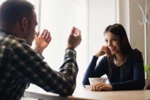 A man and woman talking