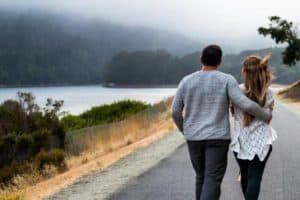 Couple walking on road