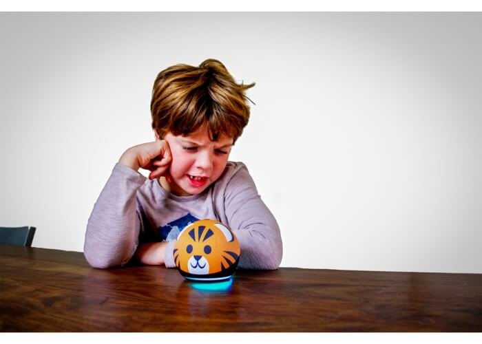 Child talking to a nearby Alexa device
