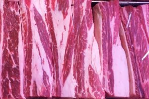 Fat contributes texture and distinct flavor to farm raised beef (shown here) and other meats. Researchers have replicated the texture and composition of natural fat in fat tissue grown from cells.