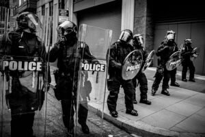 Black and white image of a police line