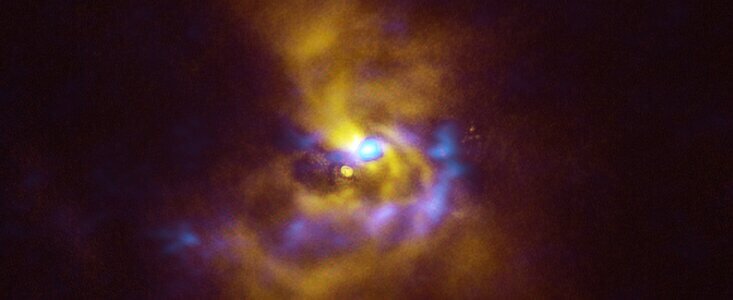 Combined SPHERE and ALMA image of material orbiting V960 Mon