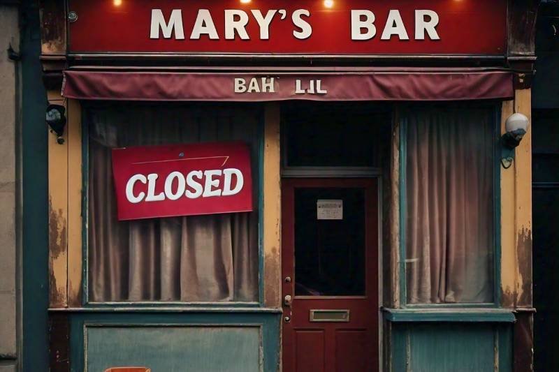 A bar with a closed sign in the window