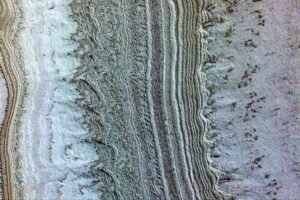 This image taken by NASA’s Mars Reconnaissance Orbiter shows ice sheets at Mars’ south pole.