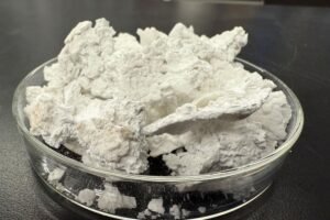 Holding half its weight in carbon dioxide, the material could replace sand in concrete and other construction materials while trapping greenhouse gas.